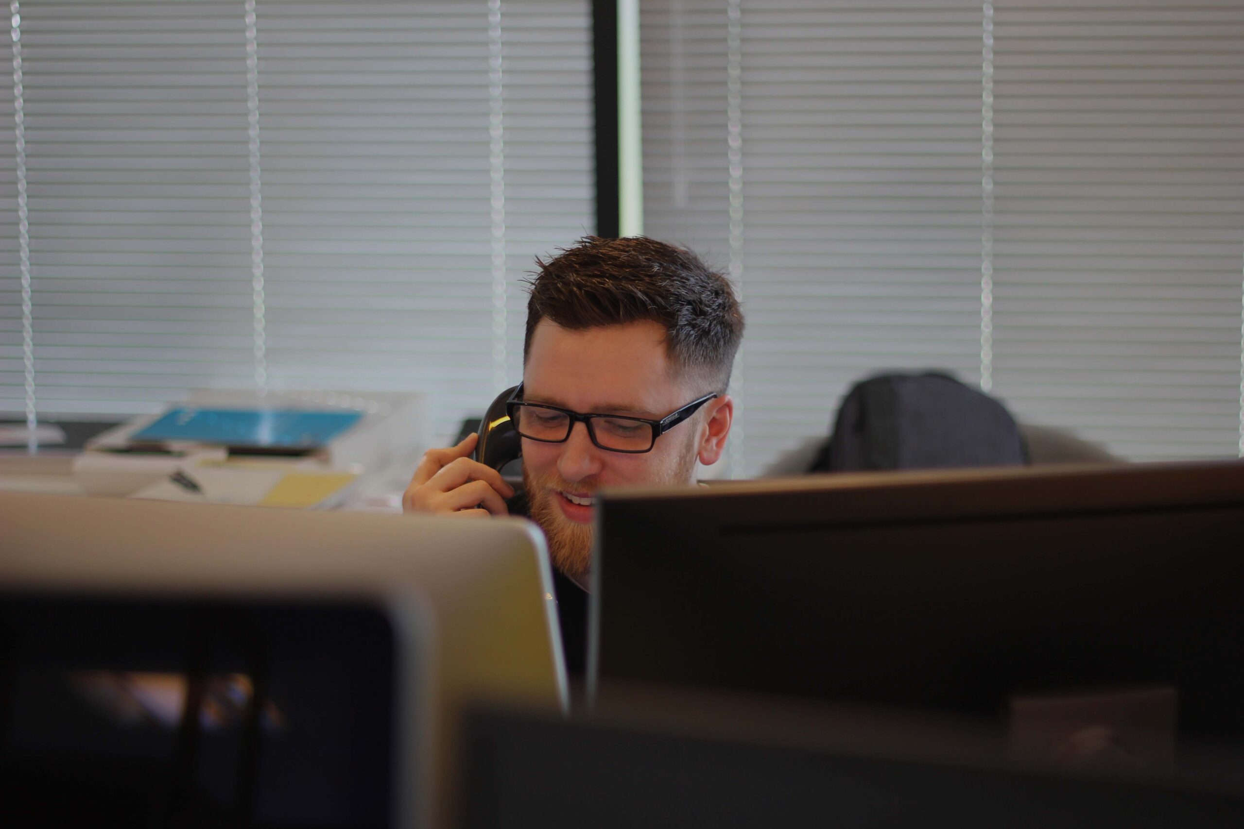 Contact us banner with communication icons and messaging elements for B2B technology support